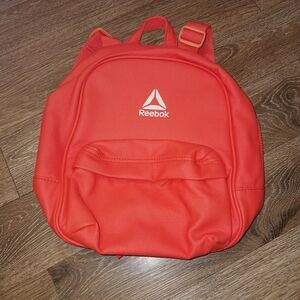 NWOT Reebok Vibrant Orange Mini Backpack